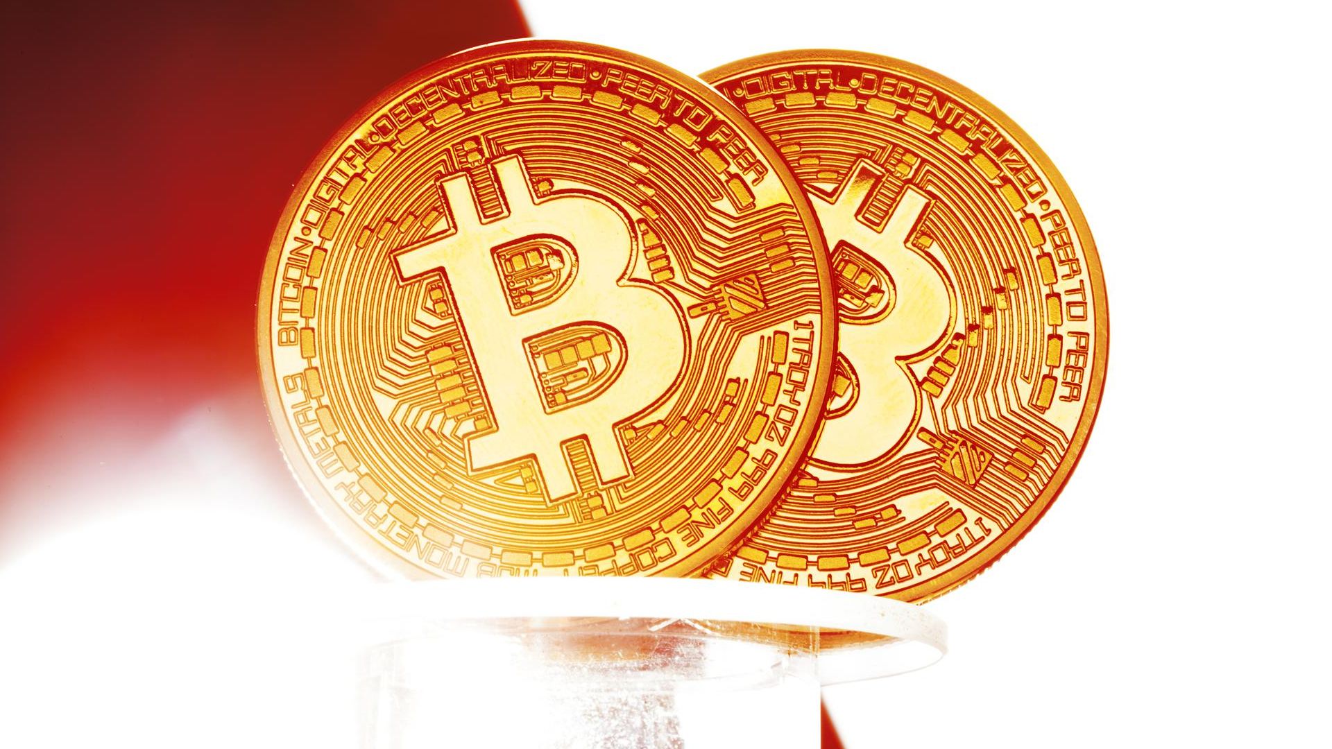 Bitcoin com fundo vermelho e branco