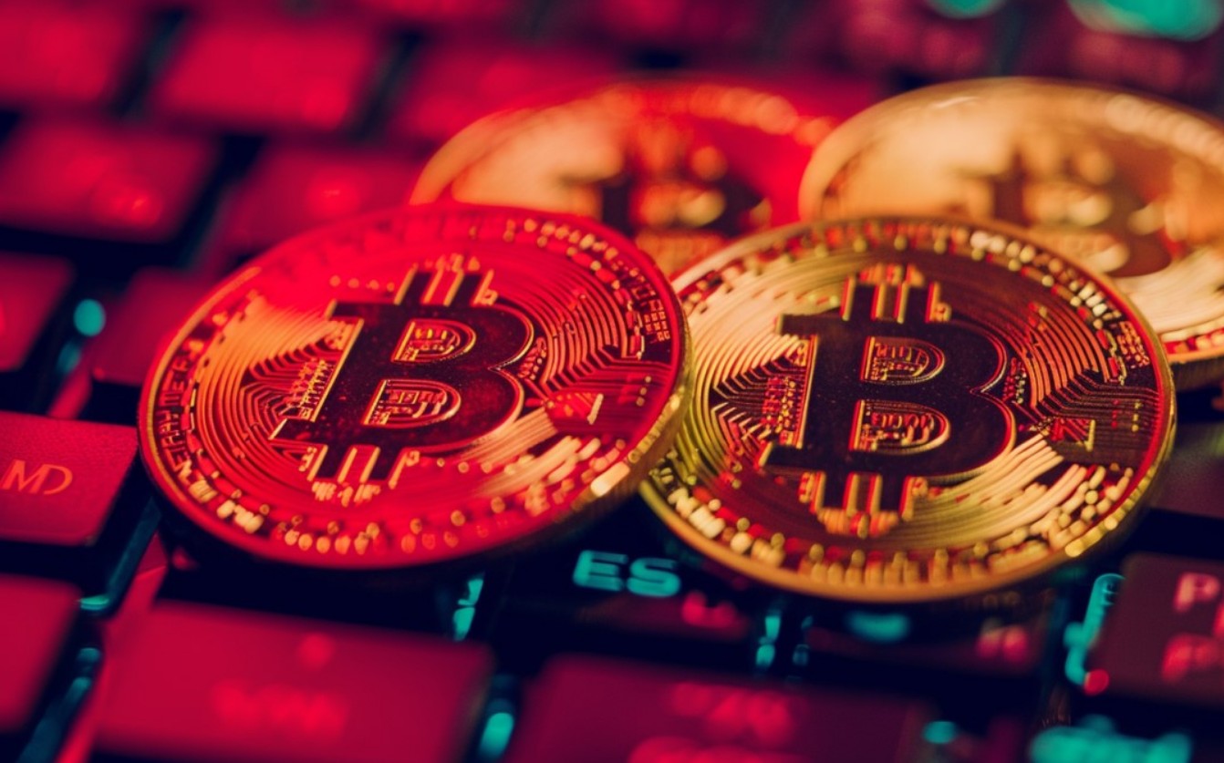 Criptomoedas em Colapso: Perda de US$ 430 Bilhões e a Sangria Continua! 1 bitcoin vermelho 1