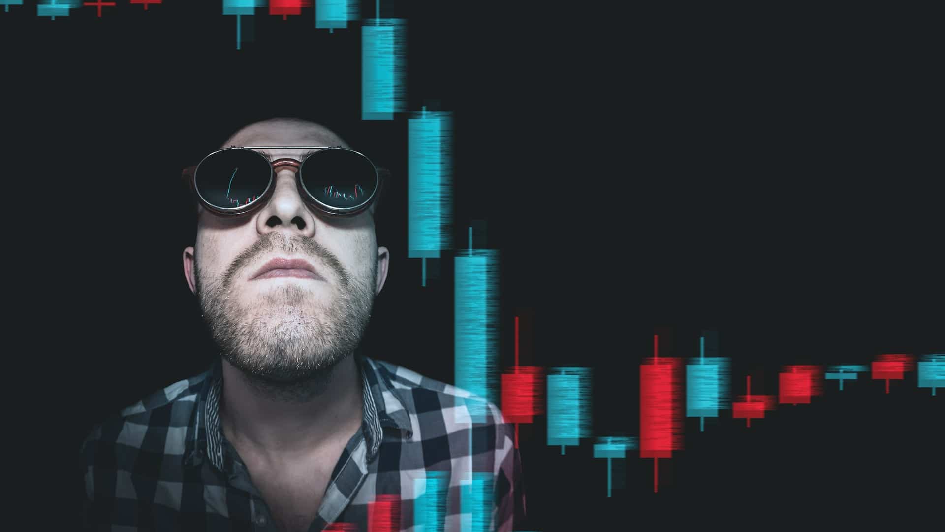 Trader Lucre R$ 1,7 Milhão em Revolução de Memecoins! 1 Trader de bitcoin olhando graficos em queda