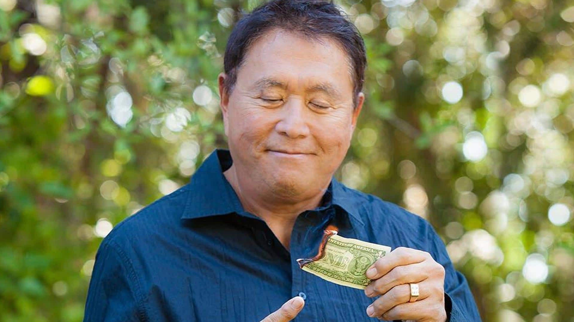 “Pai Rico, Pai Pobre” Lança Alerta: Adeus ao 60/40 e Invista em Bitcoin! 1 robert kiyosaki queimando dolar