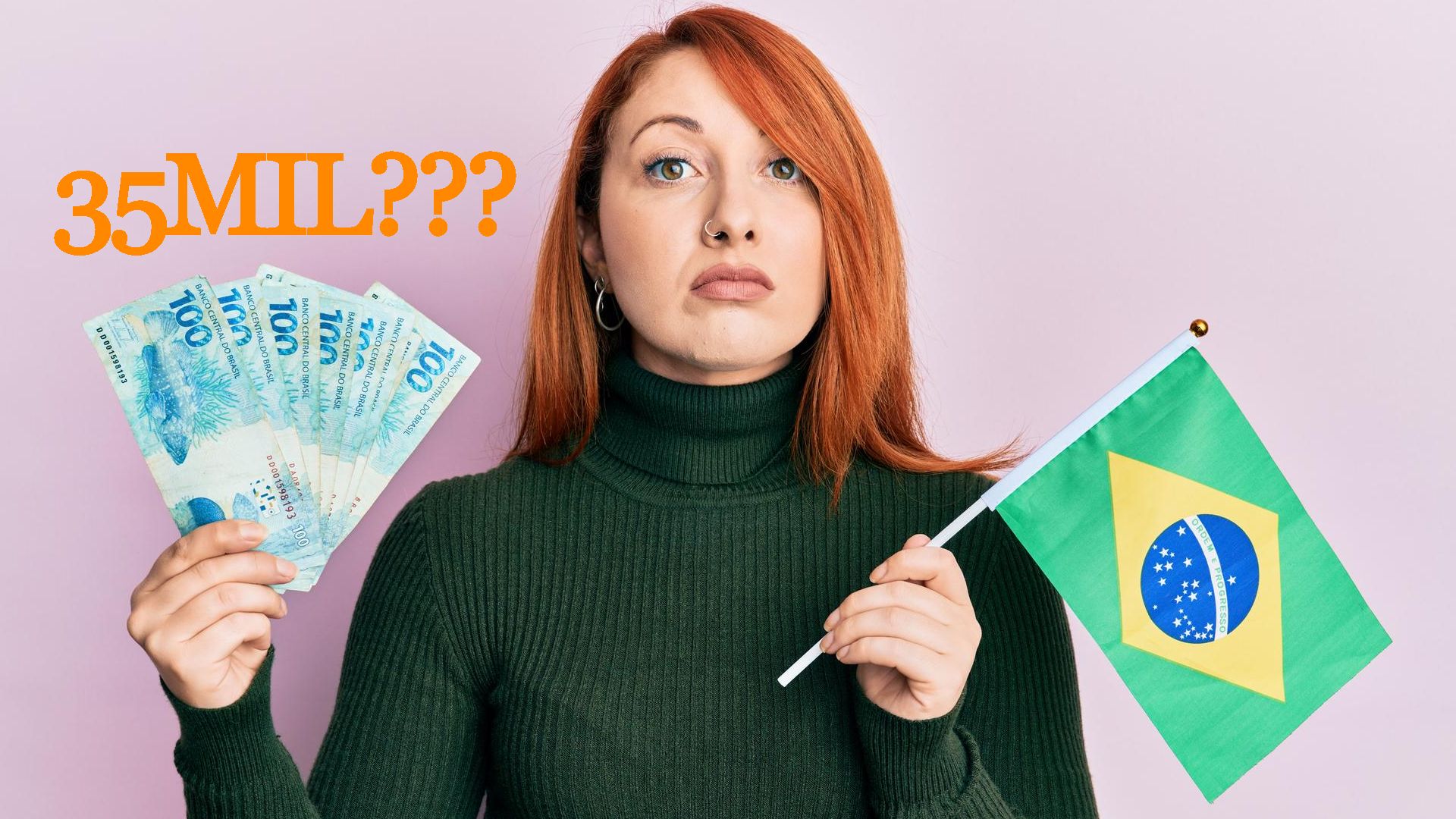 Ruiva segurando dinheiro e bandeira do Brasil