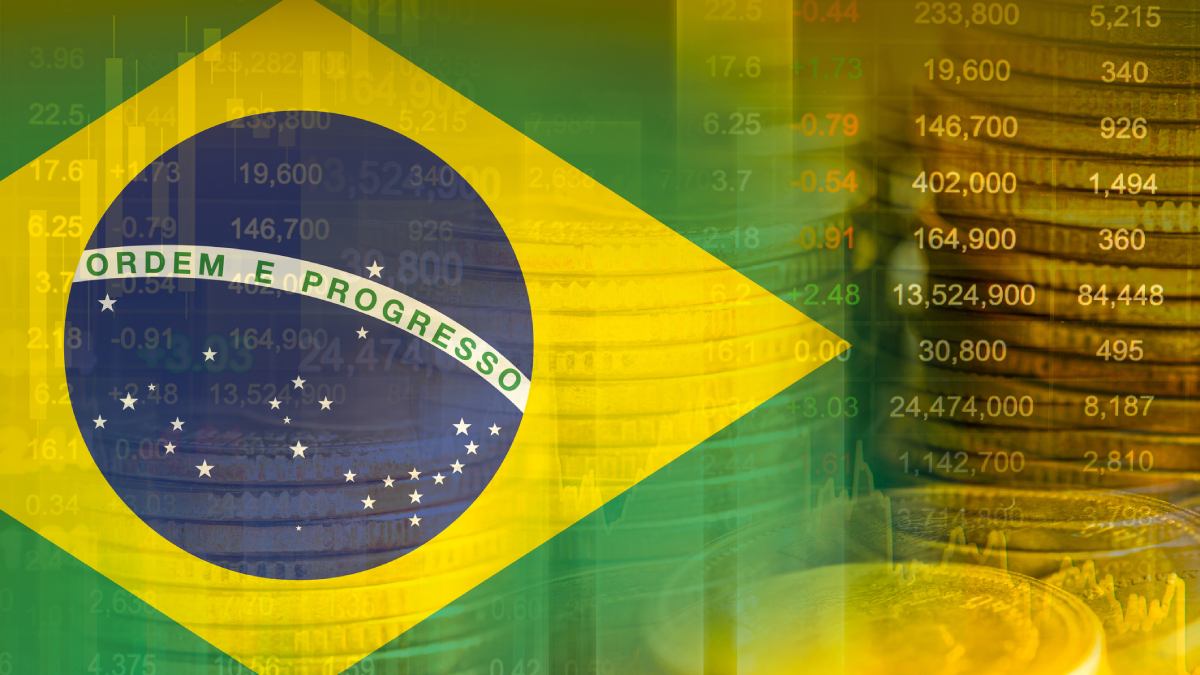 Banco da América Revela as 7 Estrelas do Brasil - E Surpreendentemente, Petrobras e Vale Ficam de Fora! 1 Moedas de real com bandeira do Brasil ao fundo