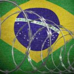 Bandeira do Brasil com cerca de arame